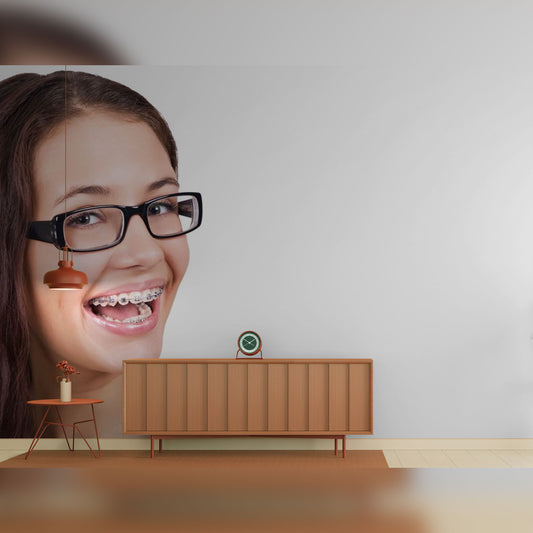 Smiling Teen with Braces and Glasses