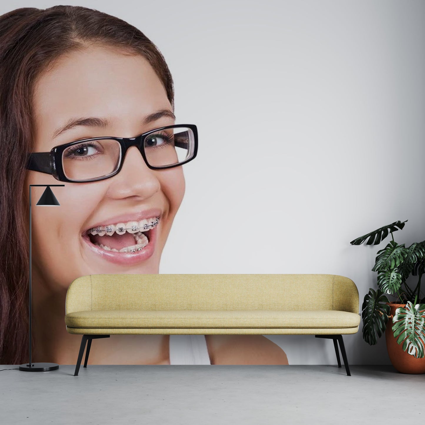 Smiling Teen with Braces and Glasses