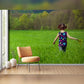 Child Playing in a Green Field