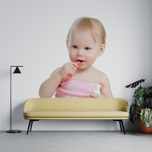 Toddler Brushing Teeth with Pink Toothbrush and Holding Toothpaste