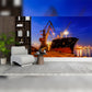 Cargo Ship Docked at a Port During Twilight