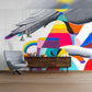 Modern Geometric Wall Mural with Vibrant Colors and Wing Detail