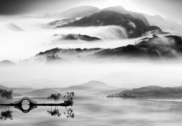 Misty Mountains and Reflections: A Timeless Landscape