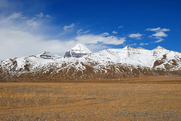 Majestic Snow-Capped Peaks under a Clear Blue Sky