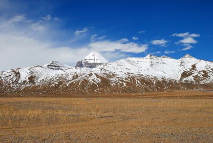 Majestic Snow-Capped Peaks under a Clear Blue Sky