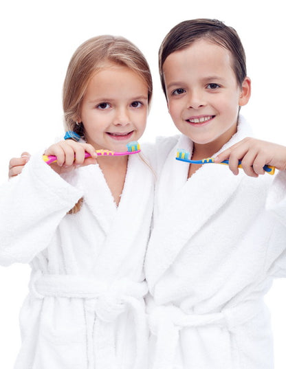 Siblings Brushing Teeth Together