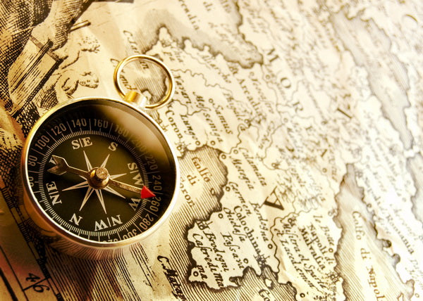 Vintage Compass on Antique Map