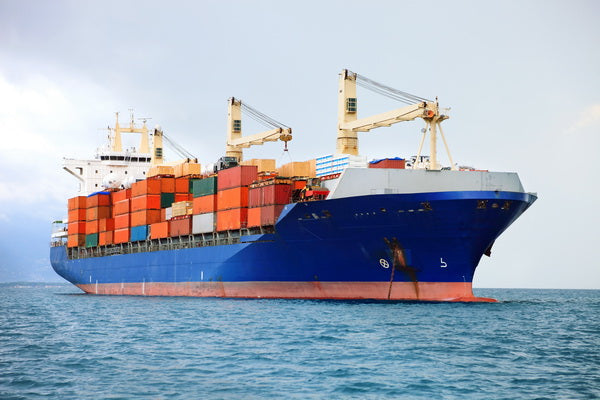 Container Ship Loaded with Cargo at Sea