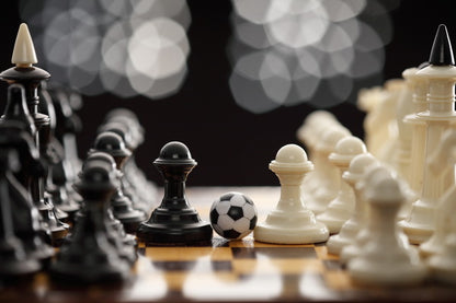 Chess Pieces with a Soccer Ball