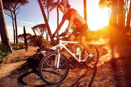 Focused Mountain Biker on a Dusty Trail