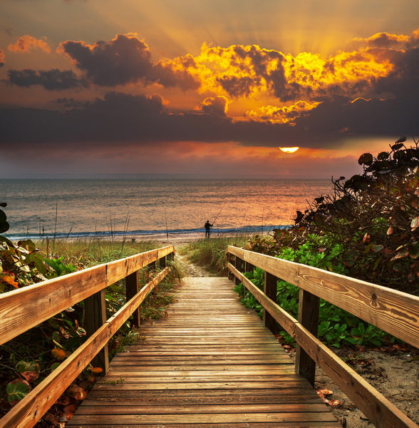 Sunset Over the Ocean from a Wooden Walkway