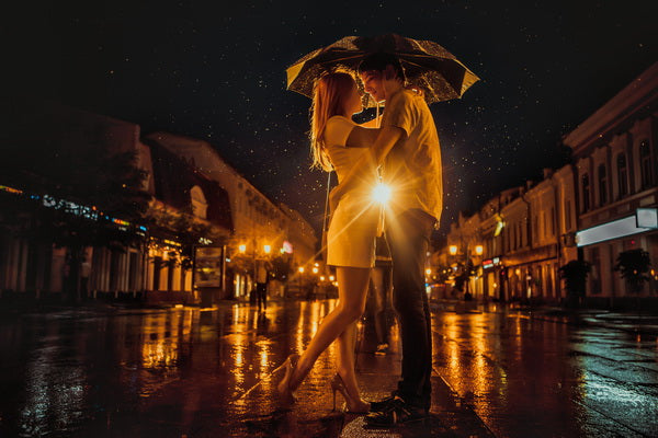 Romantic Night Embrace in the Rain