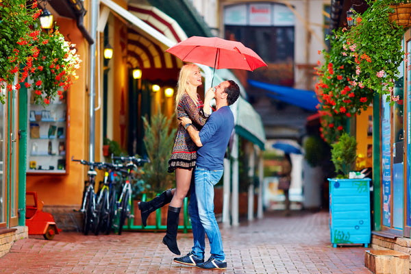 Joyful Lift Under the Red Umbrella