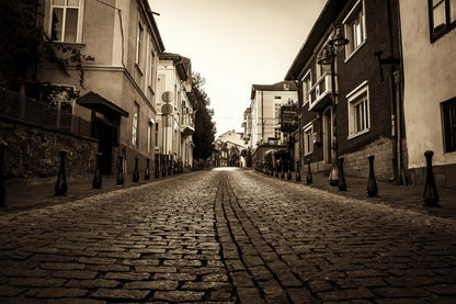 Quiet Cobblestone Street in Sepia Tones