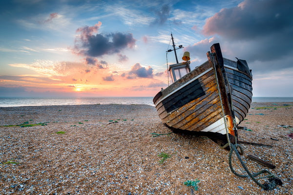 Abandoned Boat at Sunrise