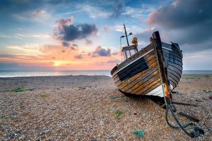 Abandoned Boat at Sunrise